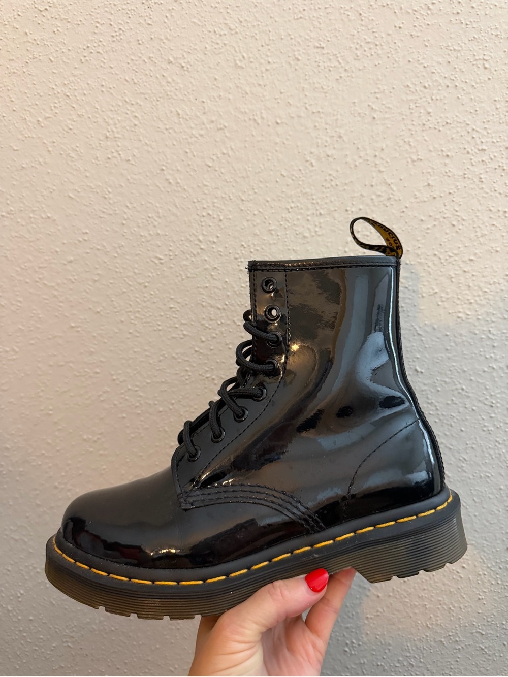 Dr. Martens Black Patent Lace-Up Boots with Yellow Stitching